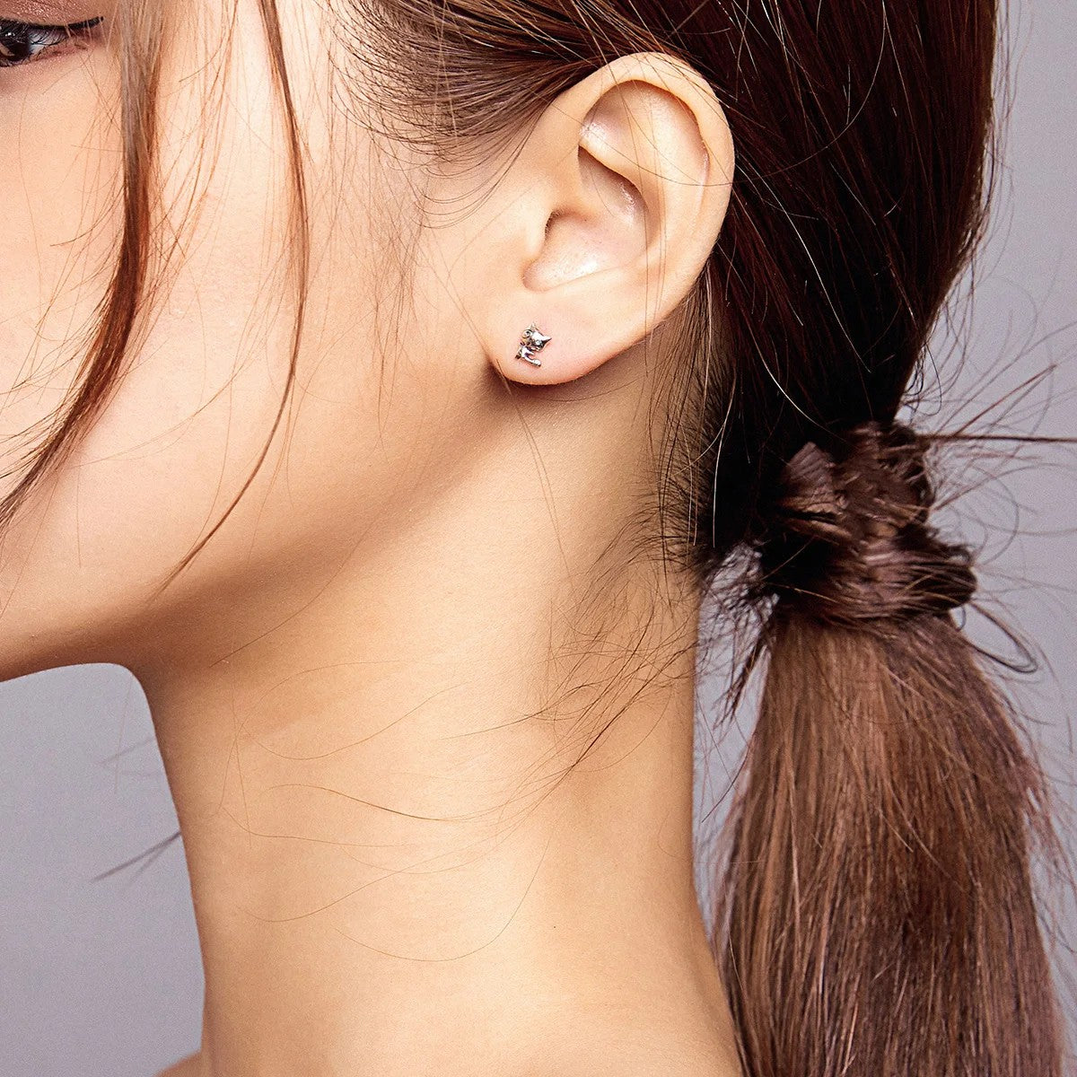 Playful Raccoon Stud Earrings