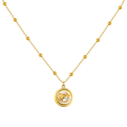 Gold Shell Charm Necklace with Crystal Pendant