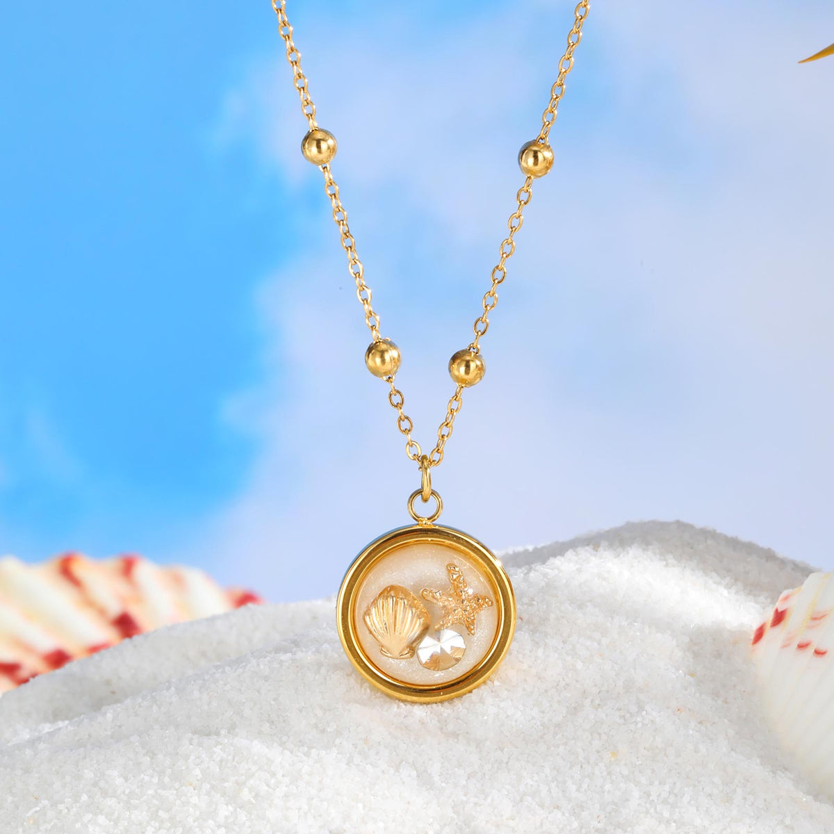 Gold Shell Charm Necklace with Crystal Pendant