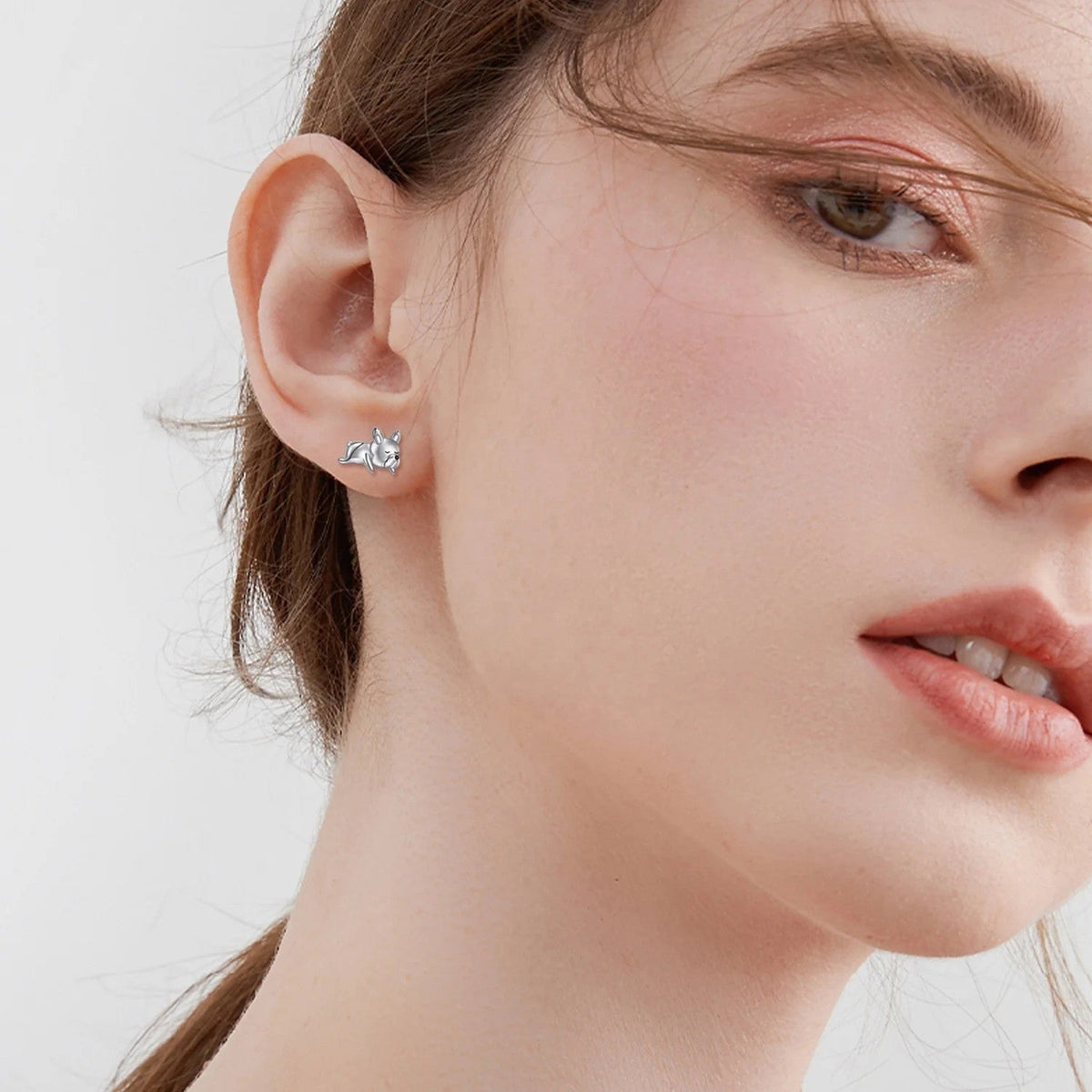 Rose Gold Lying Dog Stud Earrings